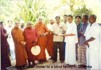 2004 Donating a water moter by Mr Karunaratna to (blind family) Jayawardena at Rajangana