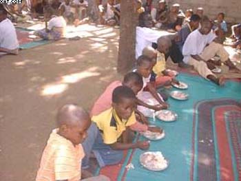 2004 - Giving food for orphans