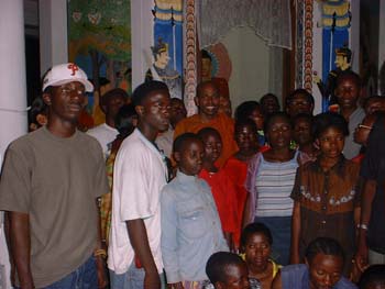 2004 - gave foods at temple for orphans came from Rwanda + burundi border