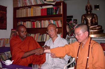 2004.10.03 - at Buddhist temple in Dar es salaam before donating wheel chairs to Government