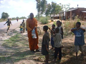 2005.12.23 - Bread and water giving to Masai and other children at Mikumi in Tanzania (3)