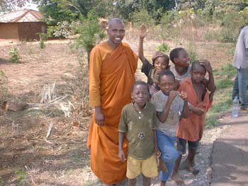 2005.12.23 - Bread and water giving to Masai and other children at Mikumi in Tanzania