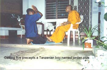 getting five precepts a Tanzanian boy named Jordan pius before go to further study about Buddhism