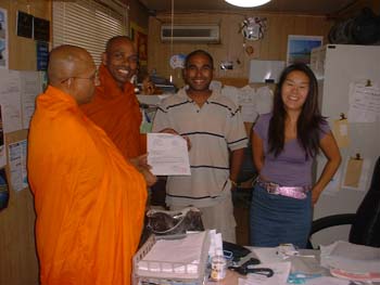 Mr Shane is hand over the letter of donation a car to Tanzania temple.