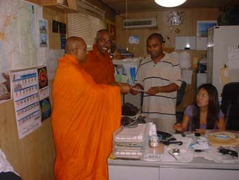 Mr Shane is hand over the letter of donation a car to Tanzania temple