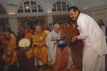 President offering a gift at President house on 17.05.2006 vesak day
