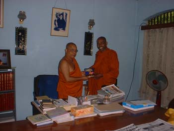 giving my credential book to K wimalajothi thero