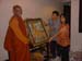 International Vesak day in Thiland 2006 - offering a Buddha's picture